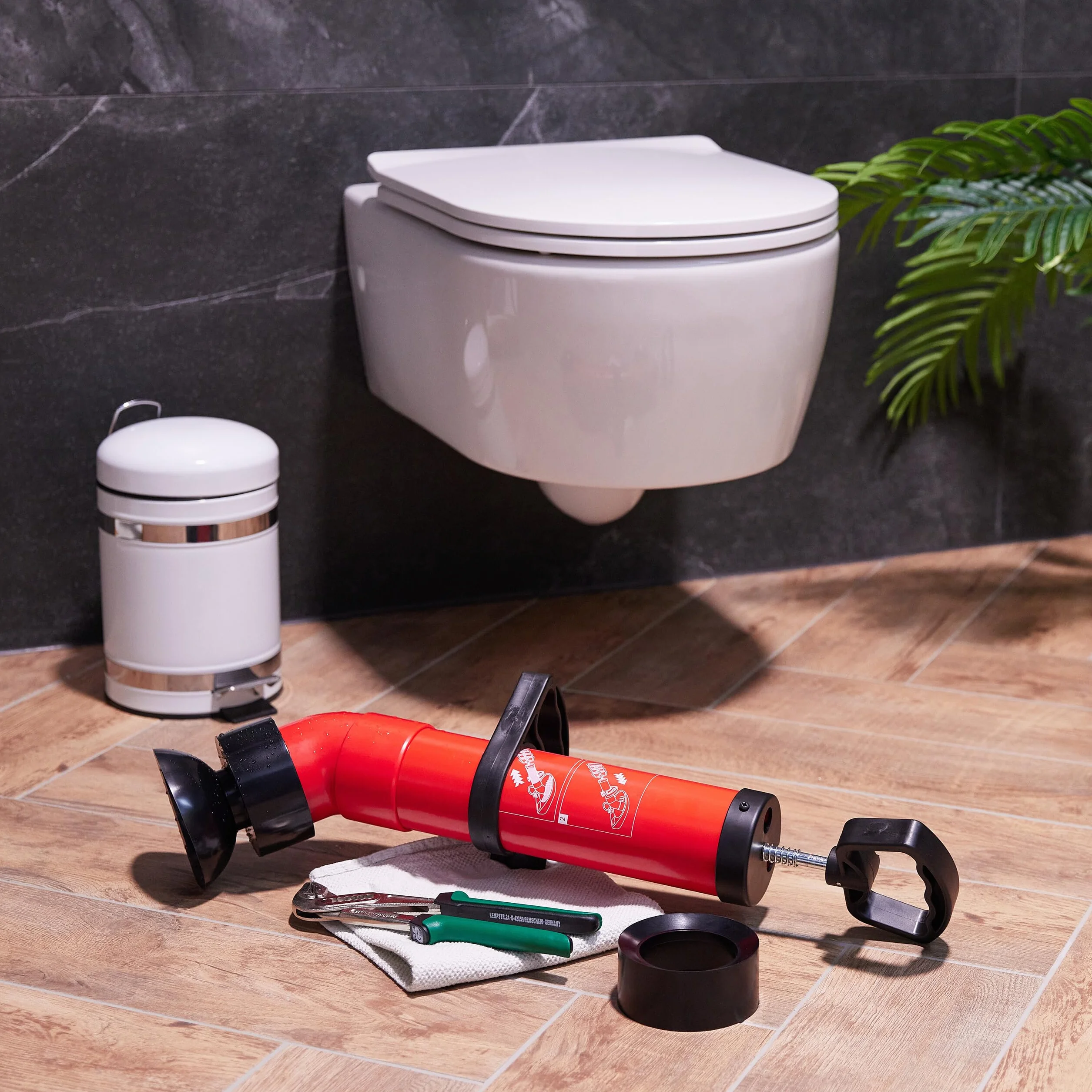 Relaxdays Rohrreinigungspumpe, 2 Aufsätze für Dusche & Waschbecken, Abflussreiniger Druckluft, chemiefrei, schwarz/rot
